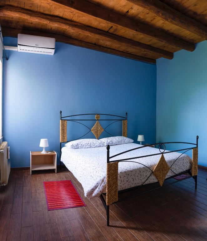 Posteľ alebo postele v izbe v ubytovaní B&B Al Vecchio Confine