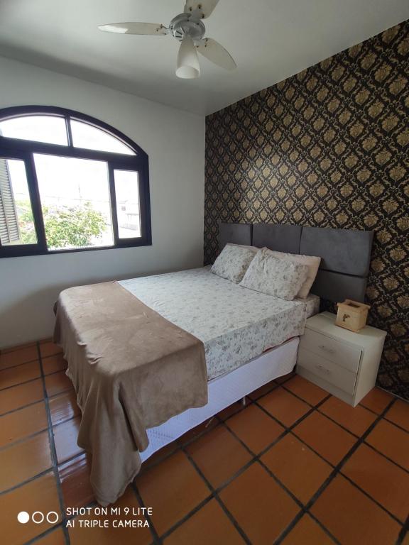  Quarto arejado com vista para o mar