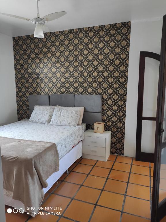  Quarto arejado com vista para o mar