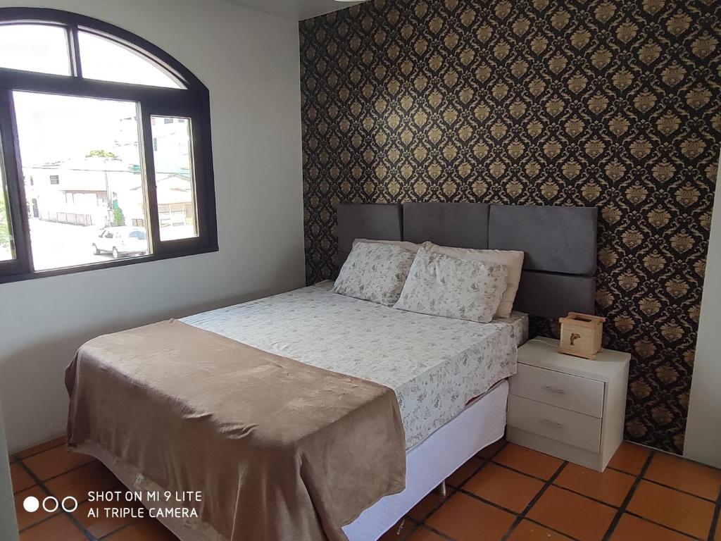  Quarto arejado com vista para o mar