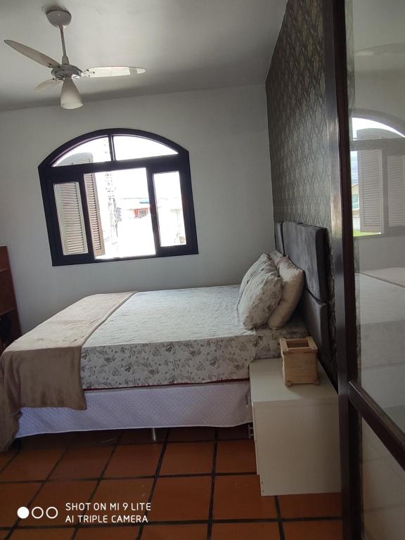  Quarto arejado com vista para o mar