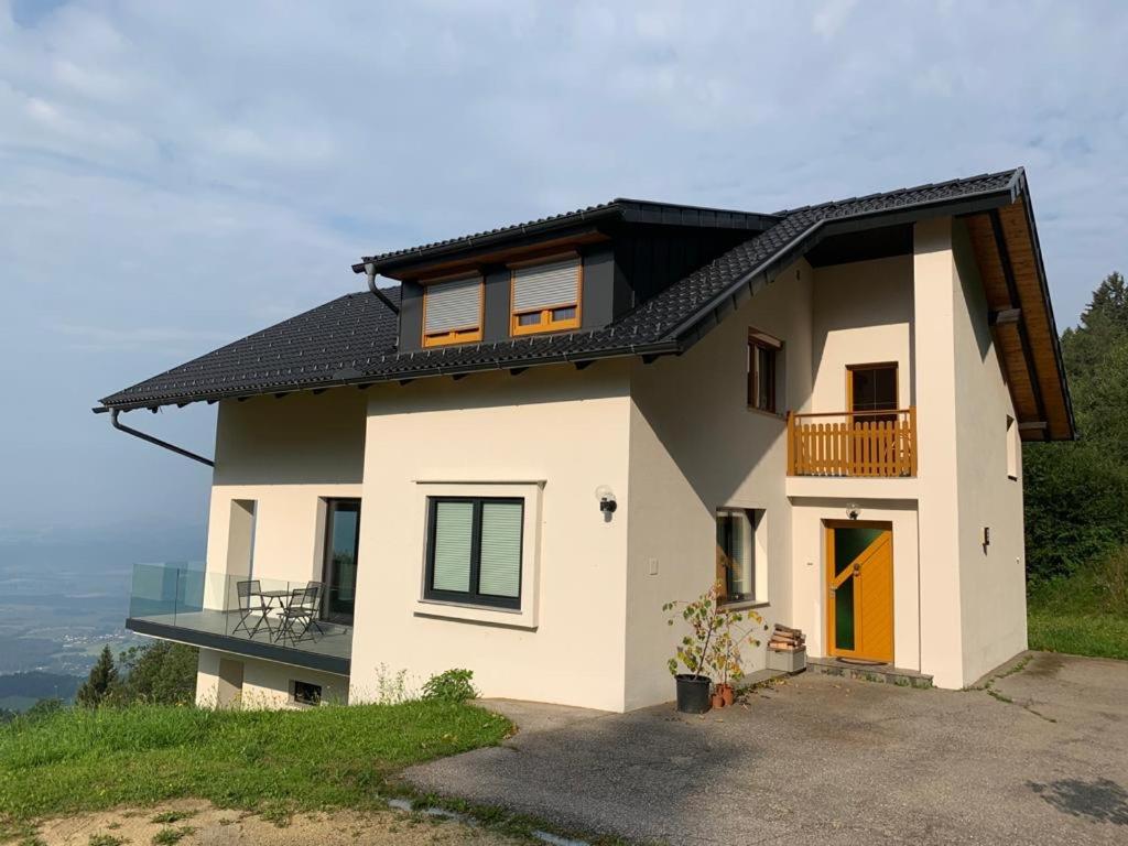 a house on the side of a hill at Apartment Fernblick in Glein