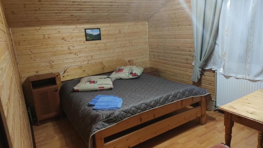 Postel nebo postele na pokoji v ubytování Sadyba Geredzhuka