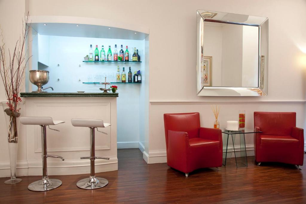 Lounge nebo bar v ubytování Gambrinus Hotel
