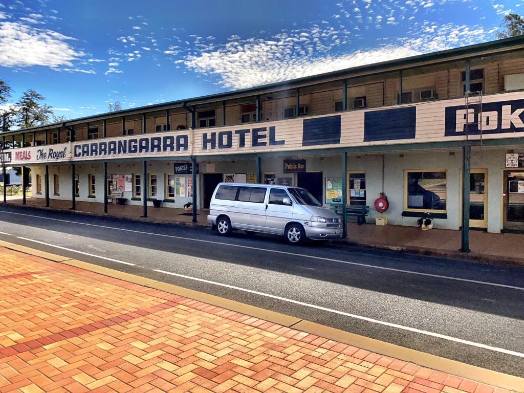 a van parked in front of a hotel at Royal Carrangarra Hotel in Tambo
