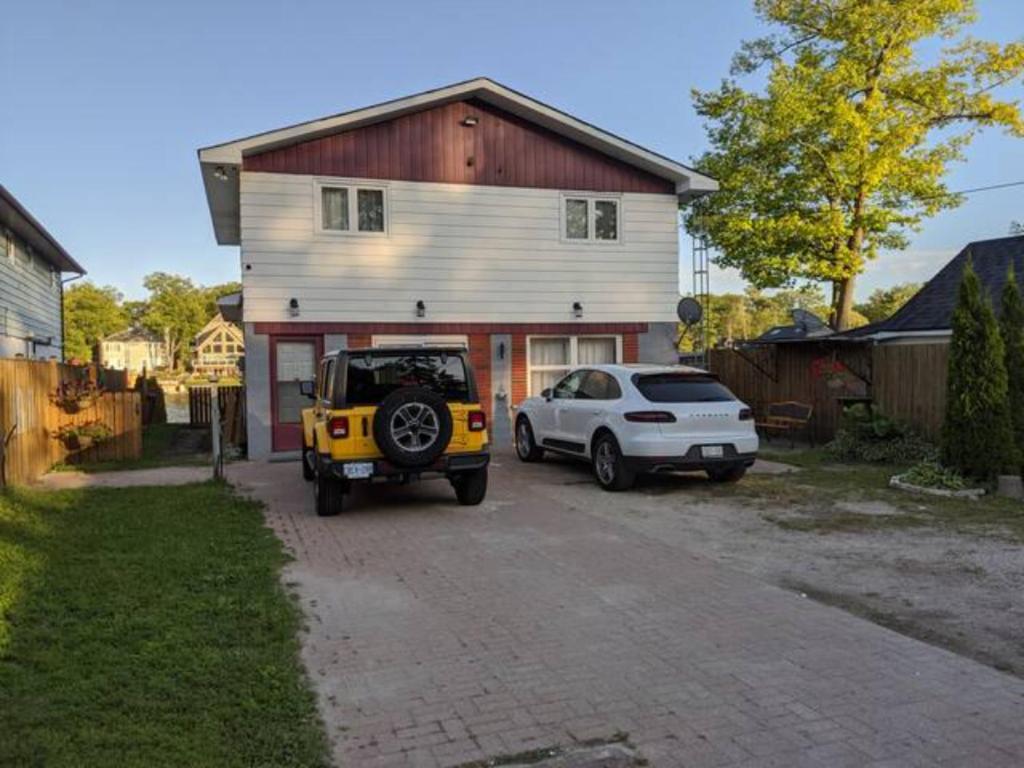 Cottage with River Front & minutes away from Beach - Huis Met Vier Slaapkamers