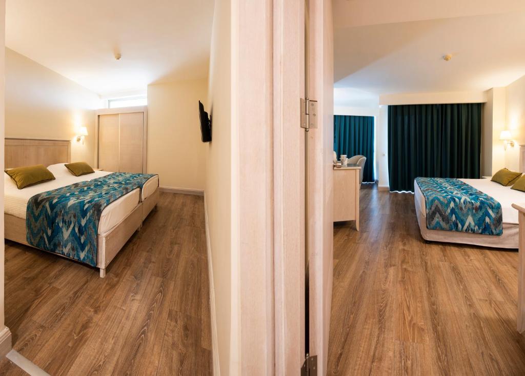 Postel nebo postele na pokoji v ubytování Side Star Park Hotel - All Inclusive