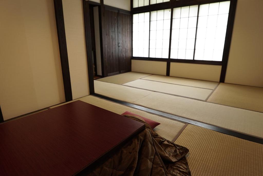 Postel nebo postele na pokoji v ubytování Hakone Onsen Yuyado Yamanoshou