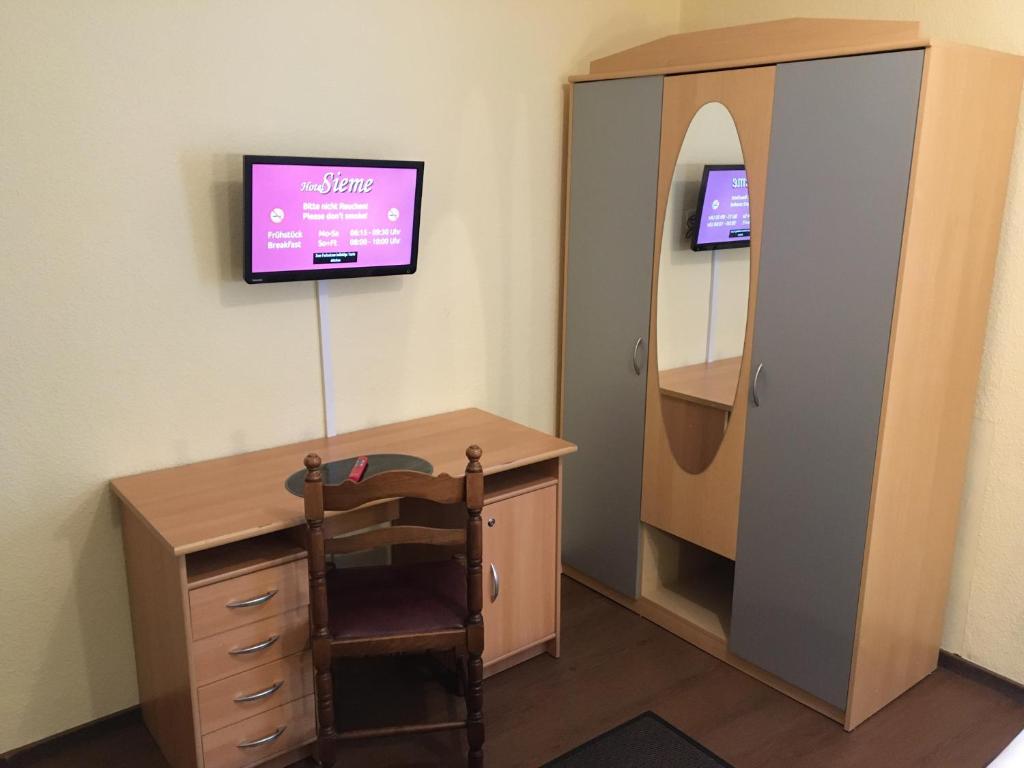 TV a/nebo společenská místnost v ubytování Hotel Sieme