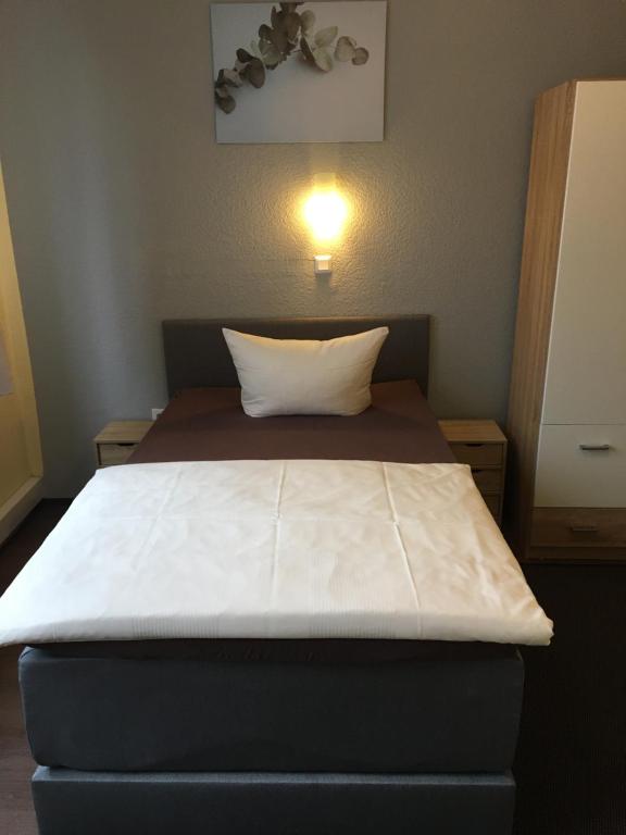 Postel nebo postele na pokoji v ubytování Hotel Sieme