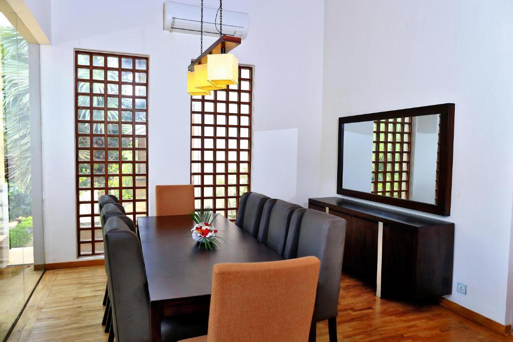 TV a/nebo společenská místnost v ubytování Amaranthe Bay Resort & Spa