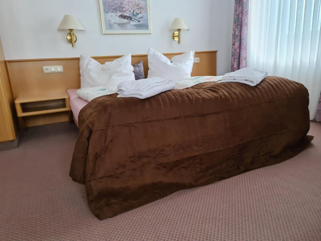 Voodi või voodid majutusasutuse Familien-Hotel Am Tränkbachtal Frauenwald toas