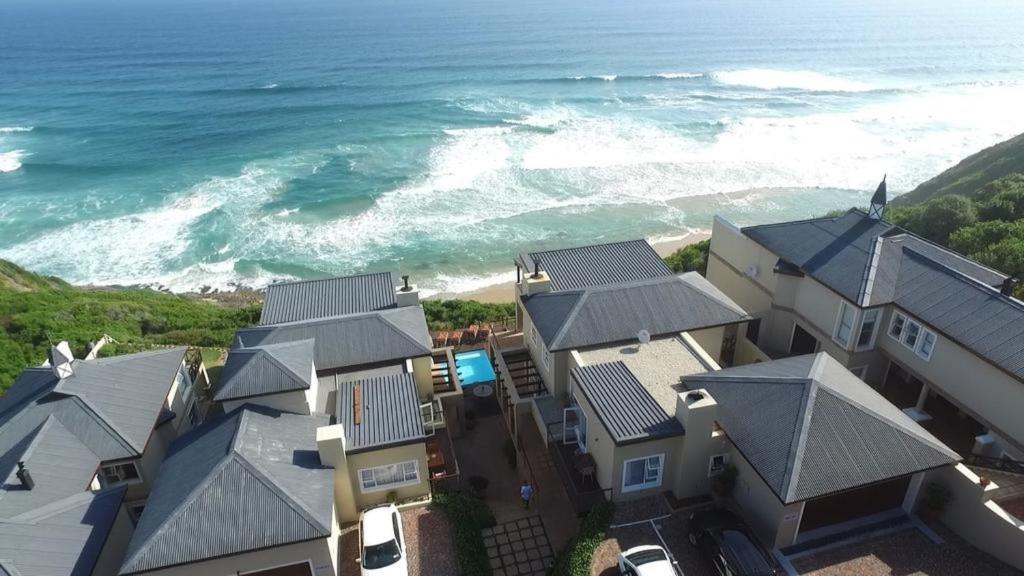 an aerial view of a house next to the ocean at Sea View 3 bedrooms Villa in Brenton On The Rocks in Brenton-on-Sea