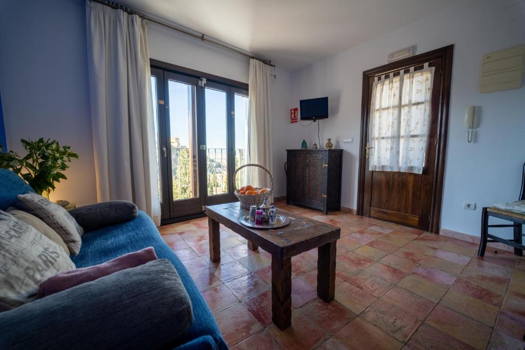 TV a/nebo společenská místnost v ubytování Apartamentos Montesclaros