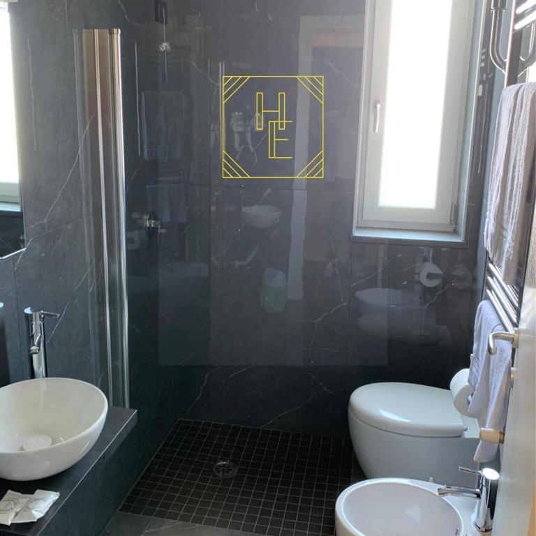 Koupelna v ubytování Hotel Elite