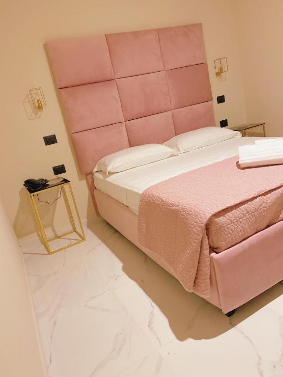 Postel nebo postele na pokoji v ubytování Hotel Elite
