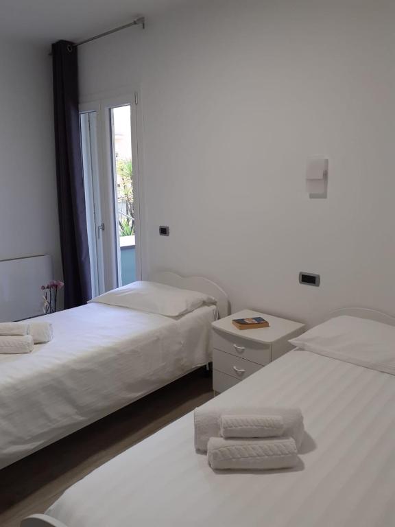 Postel nebo postele na pokoji v ubytování Giosam Bed & Breakfast di Raimondo Isabelle