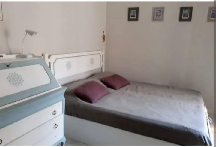 Postel nebo postele na pokoji v ubytování LE ORIGINI casa in borgo tipico lucano