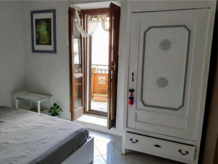 Postel nebo postele na pokoji v ubytování LE ORIGINI casa in borgo tipico lucano