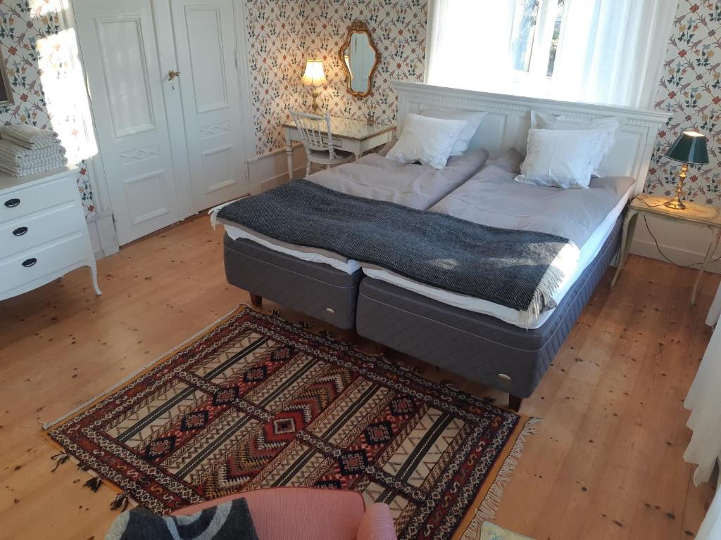 Postel nebo postele na pokoji v ubytování Hoby Gård B&B