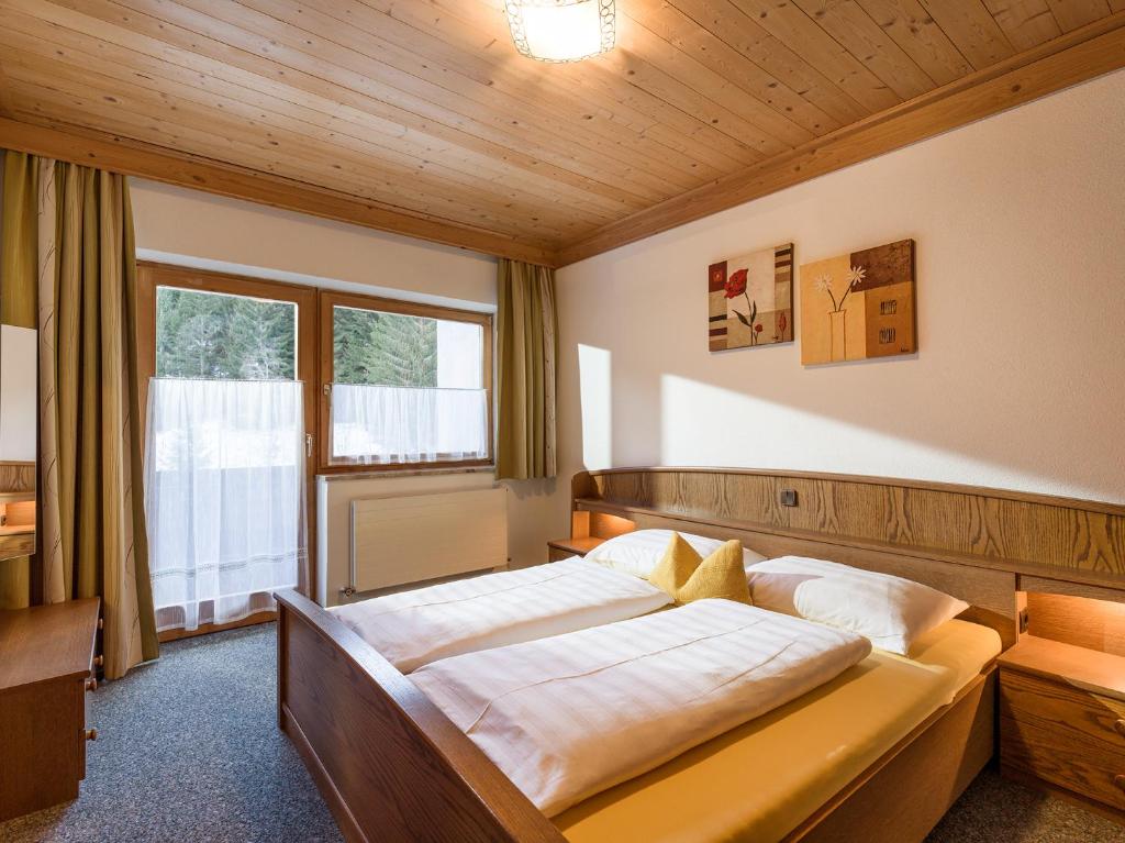 Postel nebo postele na pokoji v ubytování Appartementhaus Talwinkel
