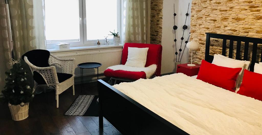 Postel nebo postele na pokoji v ubytování Apartments Centrum