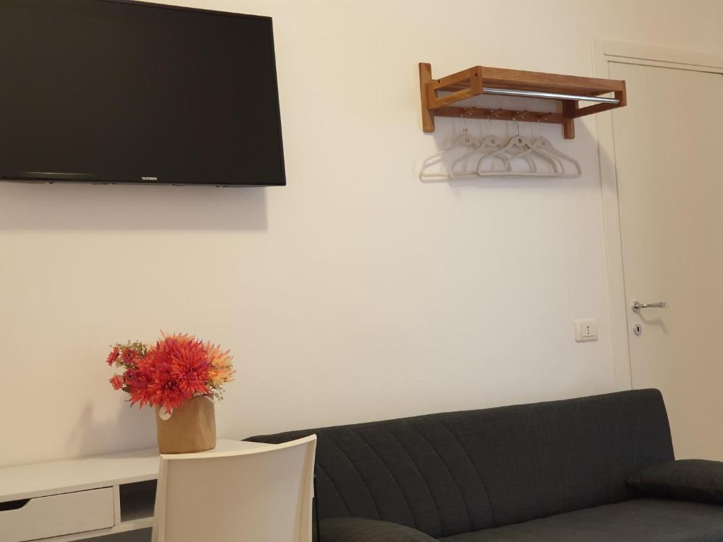 TV a/nebo společenská místnost v ubytování Terra di Venere