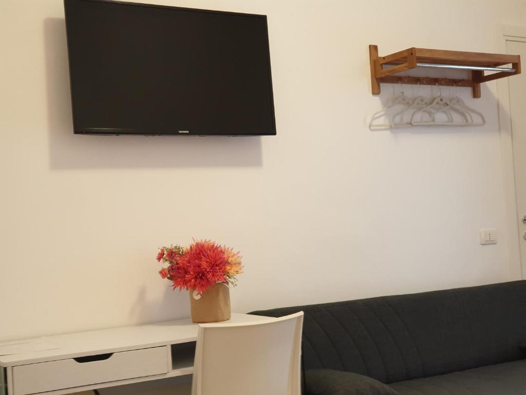 TV a/nebo společenská místnost v ubytování Terra di Venere