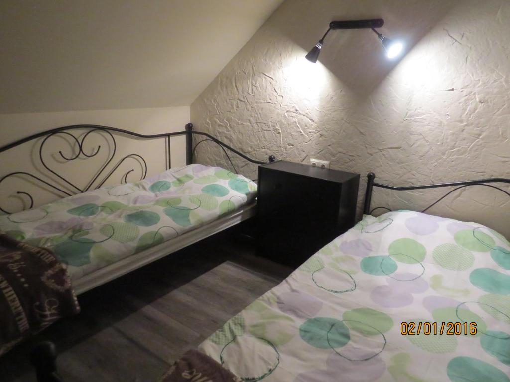 Posteľ alebo postele v izbe v ubytovaní Cudodomek SPA w Mrozach Wielkich koło Ełku