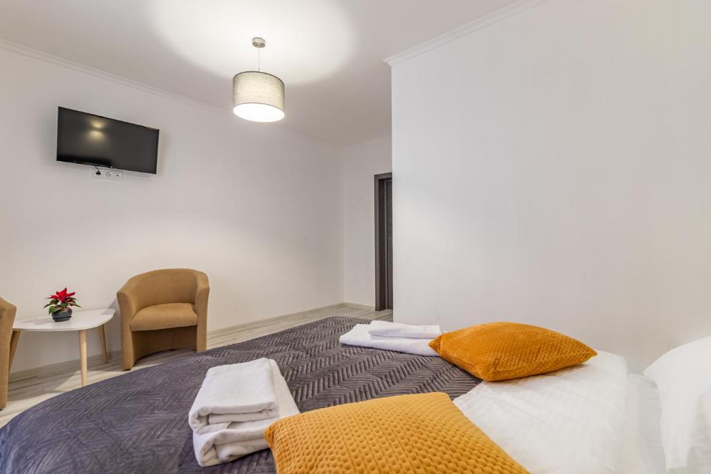 Postel nebo postele na pokoji v ubytování Konopka Forest Home & SPA