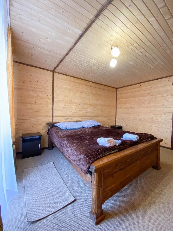 Postel nebo postele na pokoji v ubytování Краєвид
