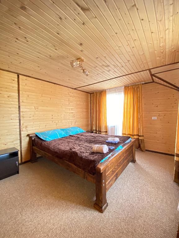 Postel nebo postele na pokoji v ubytování Краєвид