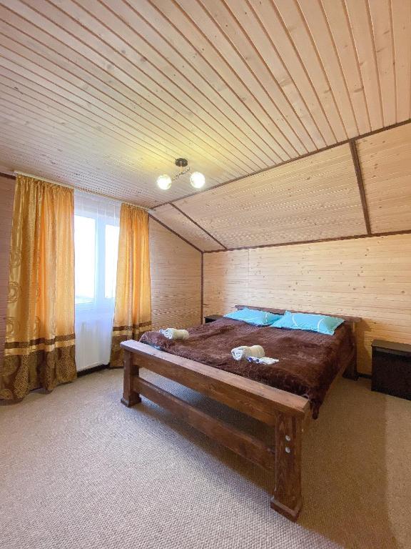 Postel nebo postele na pokoji v ubytování Краєвид