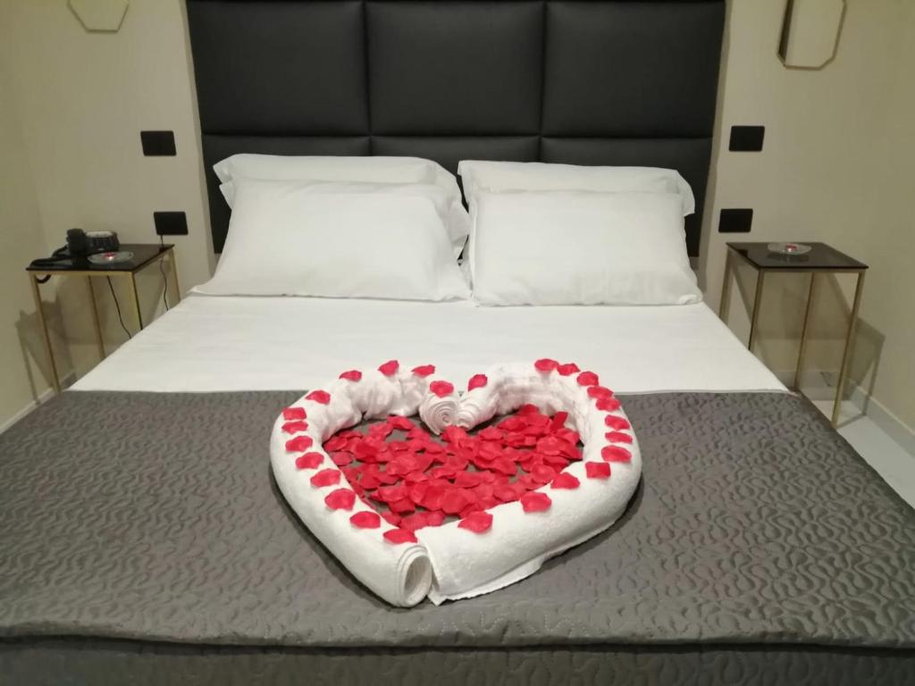 Postel nebo postele na pokoji v ubytování Hotel Elite