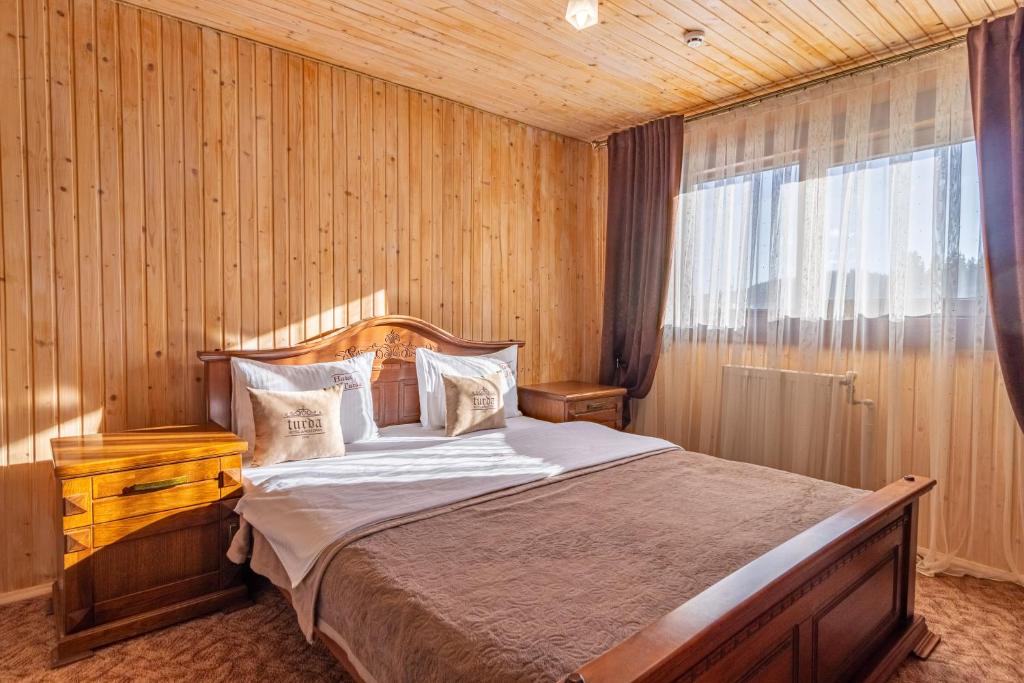 Postel nebo postele na pokoji v ubytování Guest House Turda