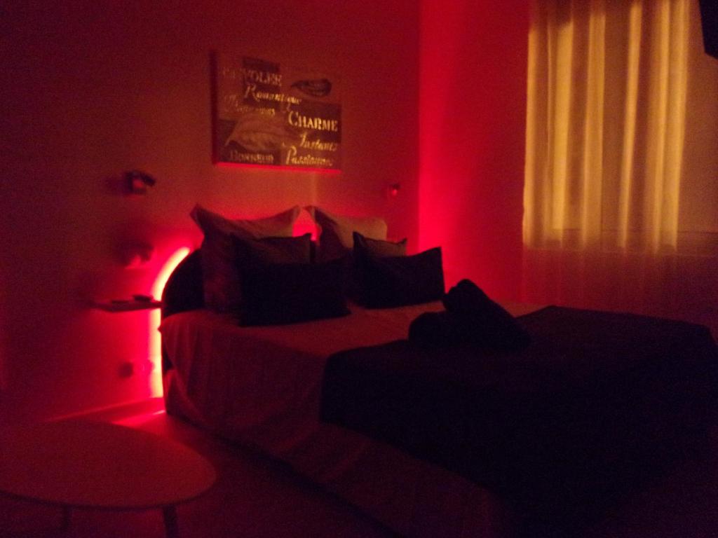 Postel nebo postele na pokoji v ubytování Le Bourget - Envolée Romantique