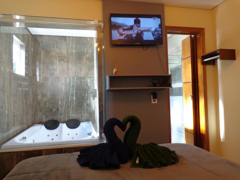  Monte Verde Inn Apartamentos&Suites com Hidromassagem dupla