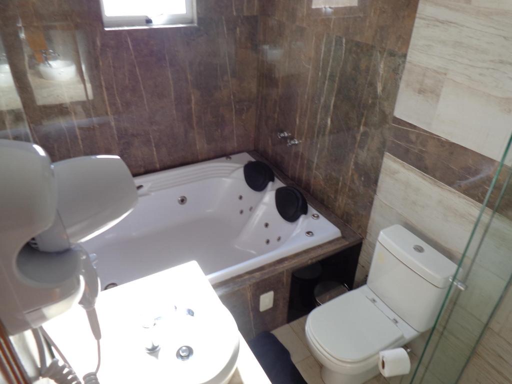  Monte Verde Inn Apartamentos&Suites com Hidromassagem dupla