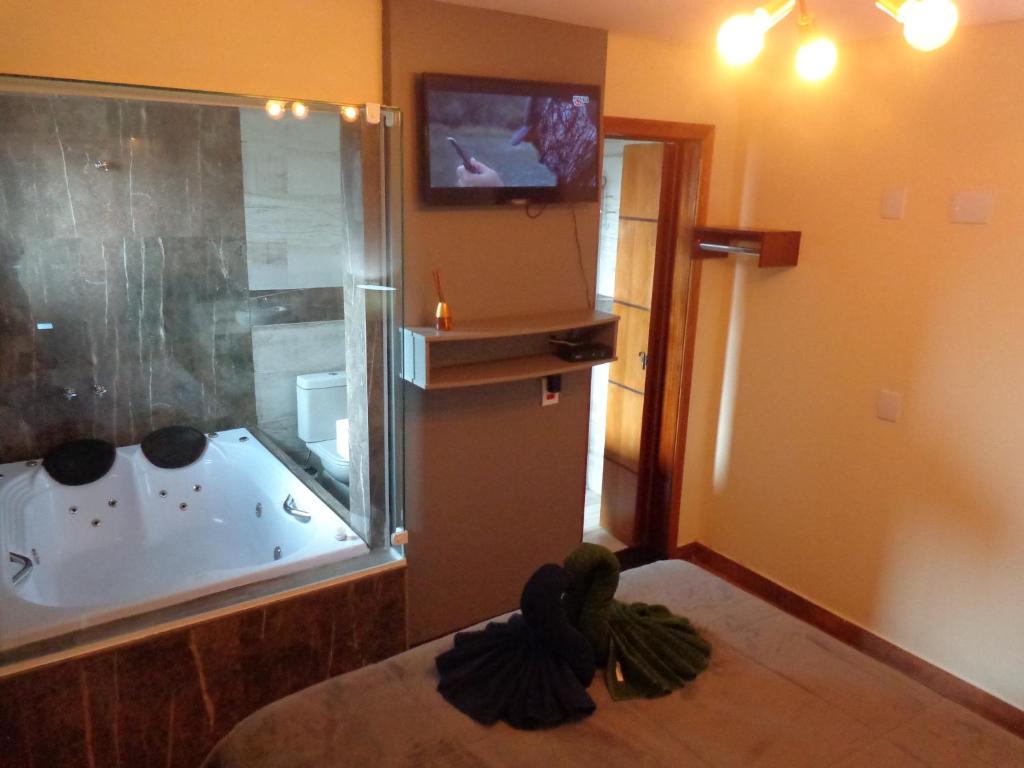  Monte Verde Inn Apartamentos&Suites com Hidromassagem dupla