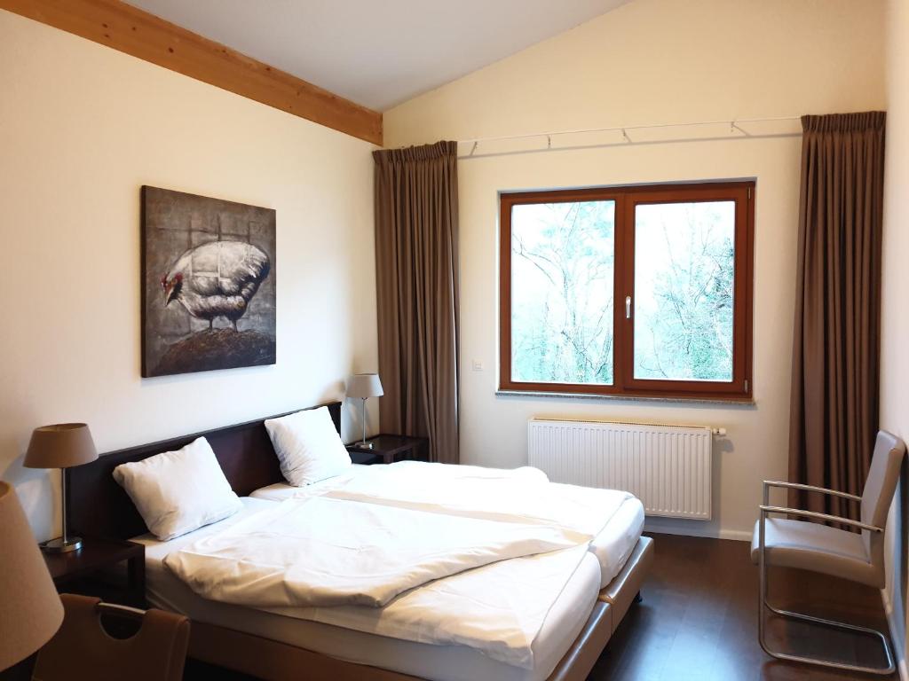 Postel nebo postele na pokoji v ubytování Walensee Apartment 80
