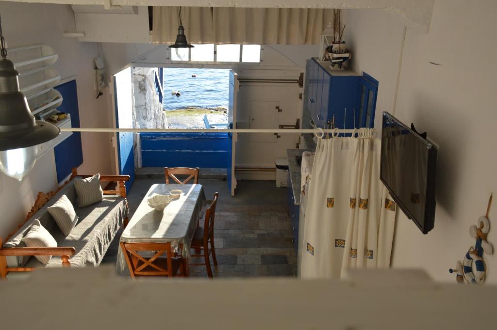 Kuchyň nebo kuchyňský kout v ubytování Captain's Boathouse, Klima Beach