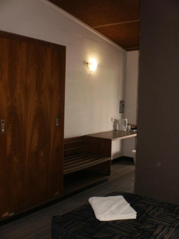 Postel nebo postele na pokoji v ubytování Blackwater Hotel Motel