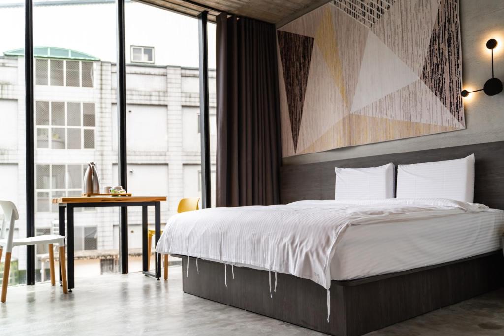 Postel nebo postele na pokoji v ubytování YZ SPA House
