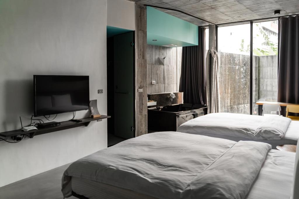 Postel nebo postele na pokoji v ubytování YZ SPA House