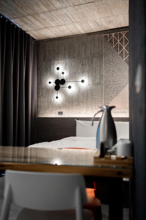 Postel nebo postele na pokoji v ubytování YZ SPA House