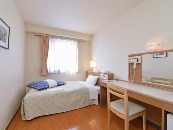 Krevet ili kreveti u jedinici u objektu Sapporo Clark Hotel