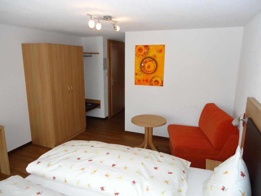 Postel nebo postele na pokoji v ubytování Hotel Monte-Moro