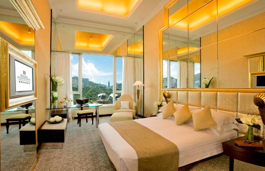 Voodi või voodid majutusasutuse Regal Hongkong Hotel toas