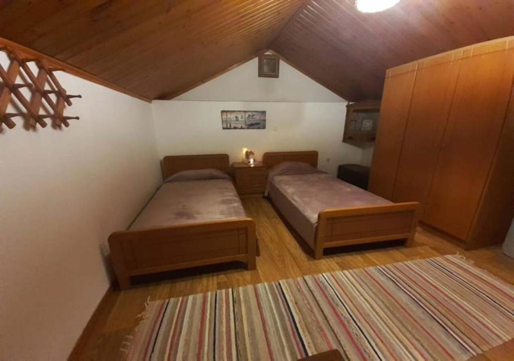 Posteľ alebo postele v izbe v ubytovaní Symi Breeze villa