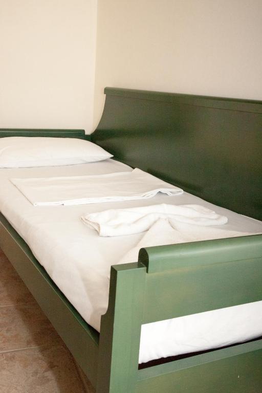 Postel nebo postele na pokoji v ubytování Meandros